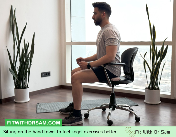 Sitting on the hand towel to feel kegel exercises better